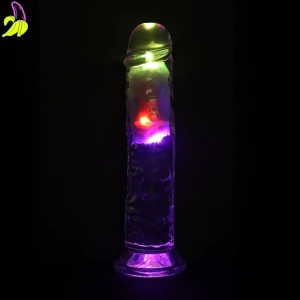 RealRock Bezbarwne dildo z wibracjami i podświetleniem LED sterowane pilotem 20cm